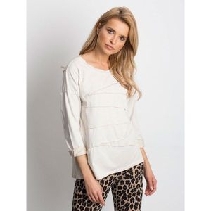 Light beige blouse with asymmetrical stitching vyobraziť