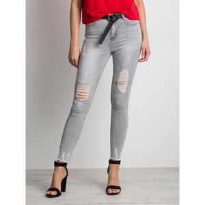 Distressed skinny jeans in gray vyobraziť