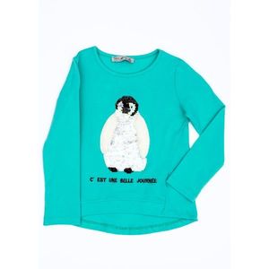 Green blouse for a girl with a penguin vyobraziť