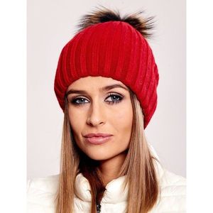 Red striped cap with fur pompom vyobraziť