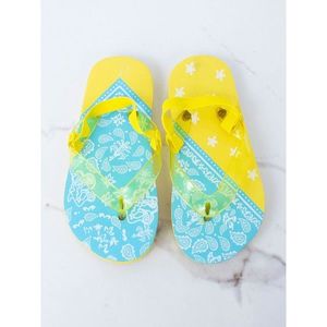 Yellow and blue children´s flip-flops vyobraziť