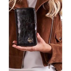 Women´s black leather wallet with a flap vyobraziť