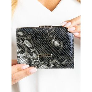 Black women´s wallet with patterns vyobraziť