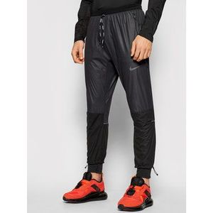 Nike Teplákové nohavice Swift Shield CU7857 Čierna Regular Fit vyobraziť