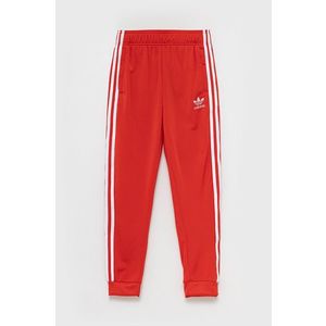 Detské nohavice adidas Originals červená farba, s nášivkou vyobraziť