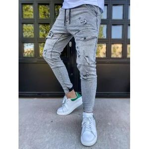 Pánske džínsovej jogger nohavice s vreckami šedej vyobraziť