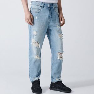 Cropp - Roztrhané džínsy - Modrá vyobraziť