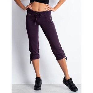 Women´s dark purple capri sweatpants with a side pocket vyobraziť