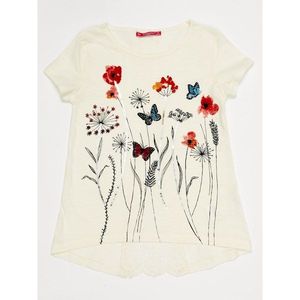 Ecru tunic for a girl with flowers and butterflies vyobraziť