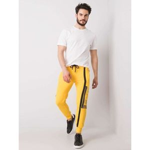 Yellow men's sweatpants with a print vyobraziť