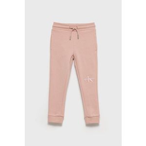 Detské bavlnené nohavice Calvin Klein Jeans ružová farba, jednofarebné vyobraziť