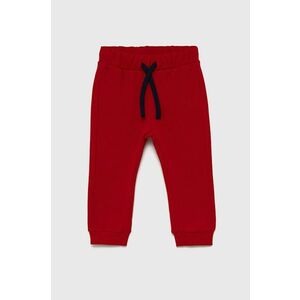 Detské bavlnené nohavice United Colors of Benetton červená farba, jednofarebné vyobraziť