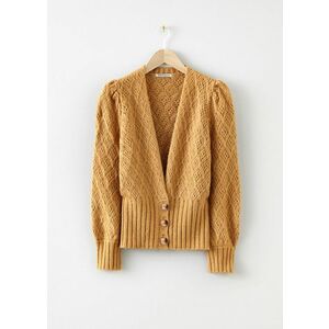 Pletený sveter so širokým lemom vyobraziť