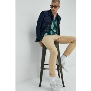 Nohavice Tommy Jeans pánske, béžová farba, priliehavé vyobraziť