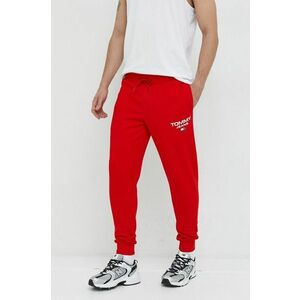 Bavlnené tepláky Tommy Jeans pánske, červená farba, s potlačou vyobraziť