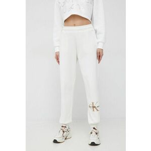 Tepláky Calvin Klein Jeans dámske, béžová farba, s potlačou vyobraziť