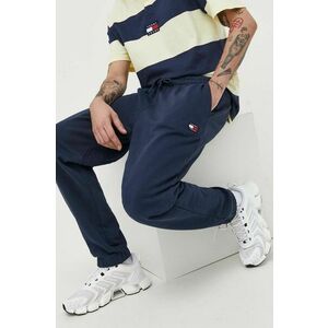Bavlnené tepláky Tommy Jeans pánske, tmavomodrá farba, jednofarebné vyobraziť