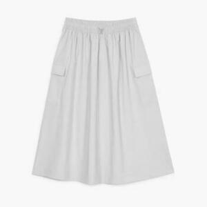 Sukňa New Balance MIDI CARGO SKIRT vyobraziť